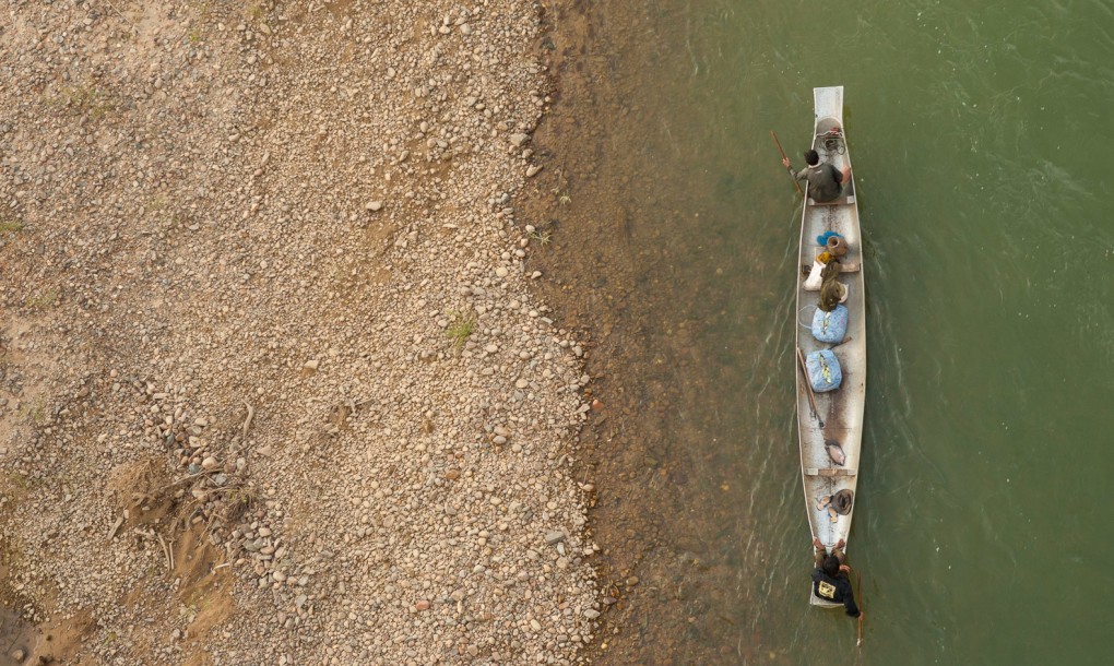 suca guerra Laos canoa mark watson